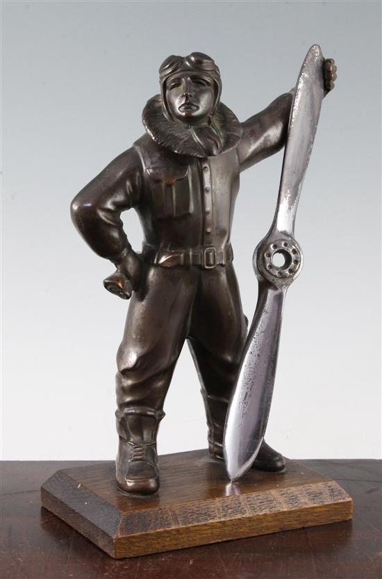 An Art Deco bronzed and chrome plated spelter aviator figural lighter, 10.75in.